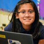 Gabrielle student with laptop