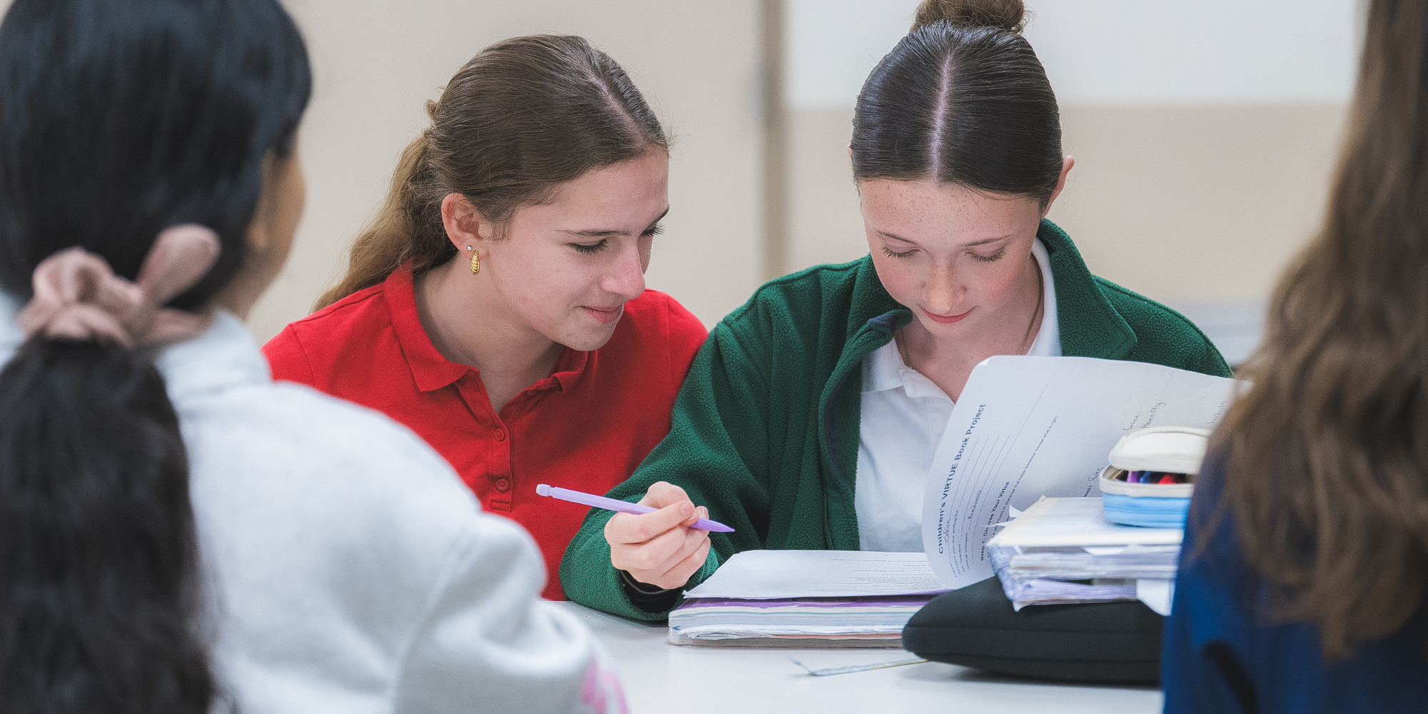 Father Allouez Catholic School students studying